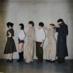 A group of people in stylish, casual attire