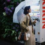 woman holding umbrella